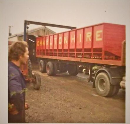 Man stood beside potato bulker